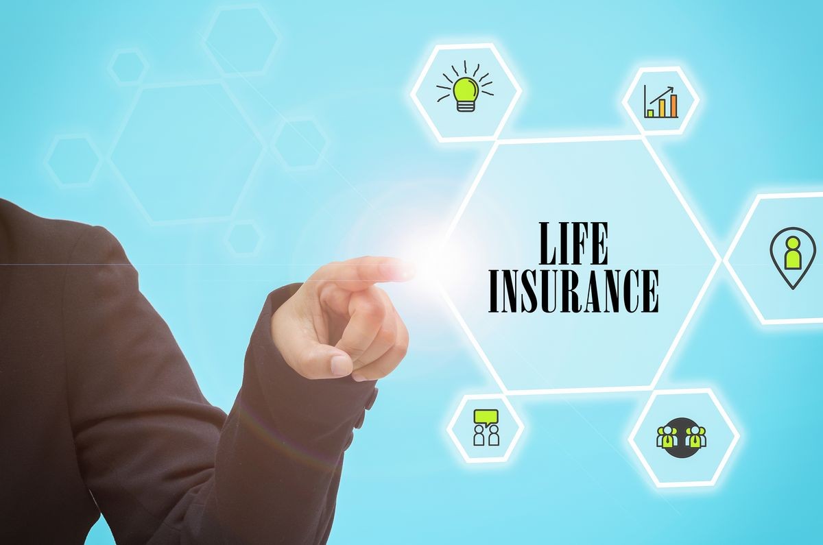 Business woman hand touching LIFE INSURANCE button on virtual screen. Business Banking Concept.